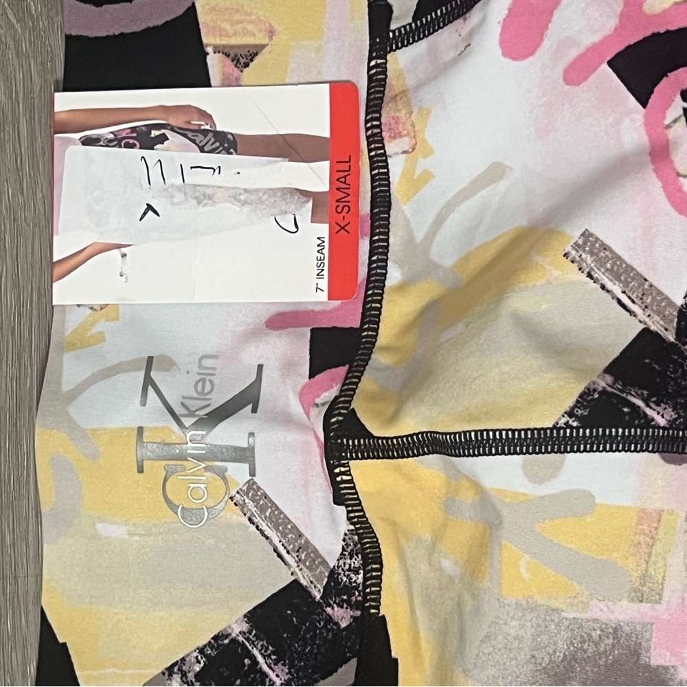Calvin Klein Black and Pink Bike Shorts with Abstract Print - Picture 7 of 9